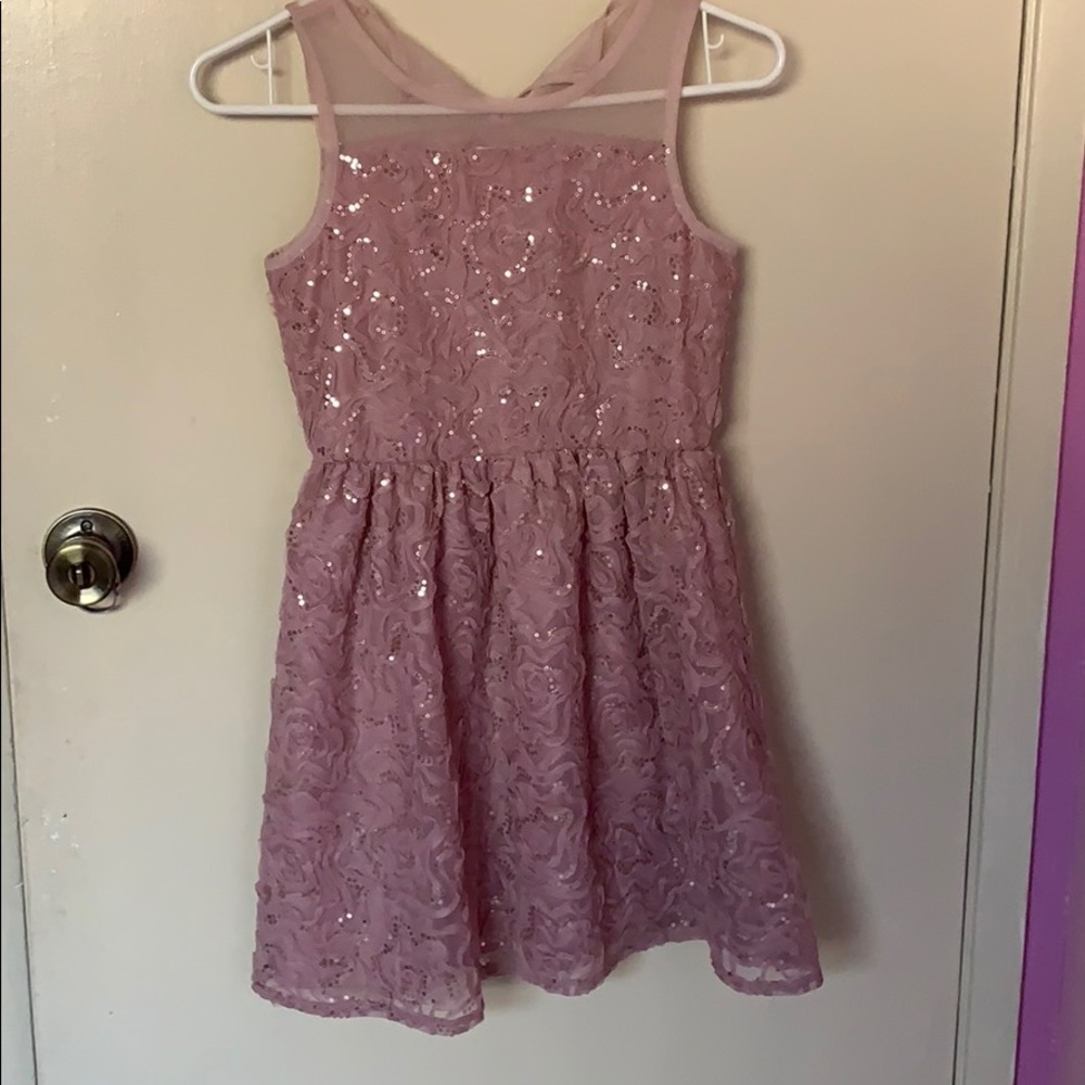 Mid length , nude - purple colored dress